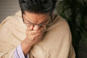 a man sneezing